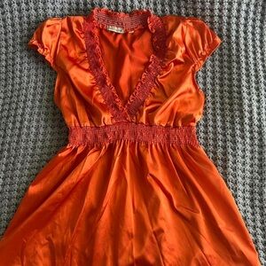 Orange Y2K tunic with ruffled neckline and waistband #y2kfashion #2000sfashion